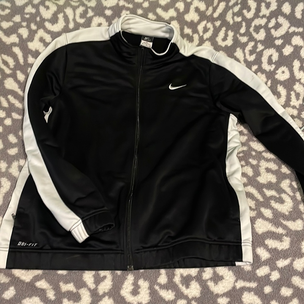 Worn lightly, Nike men’s zip up.